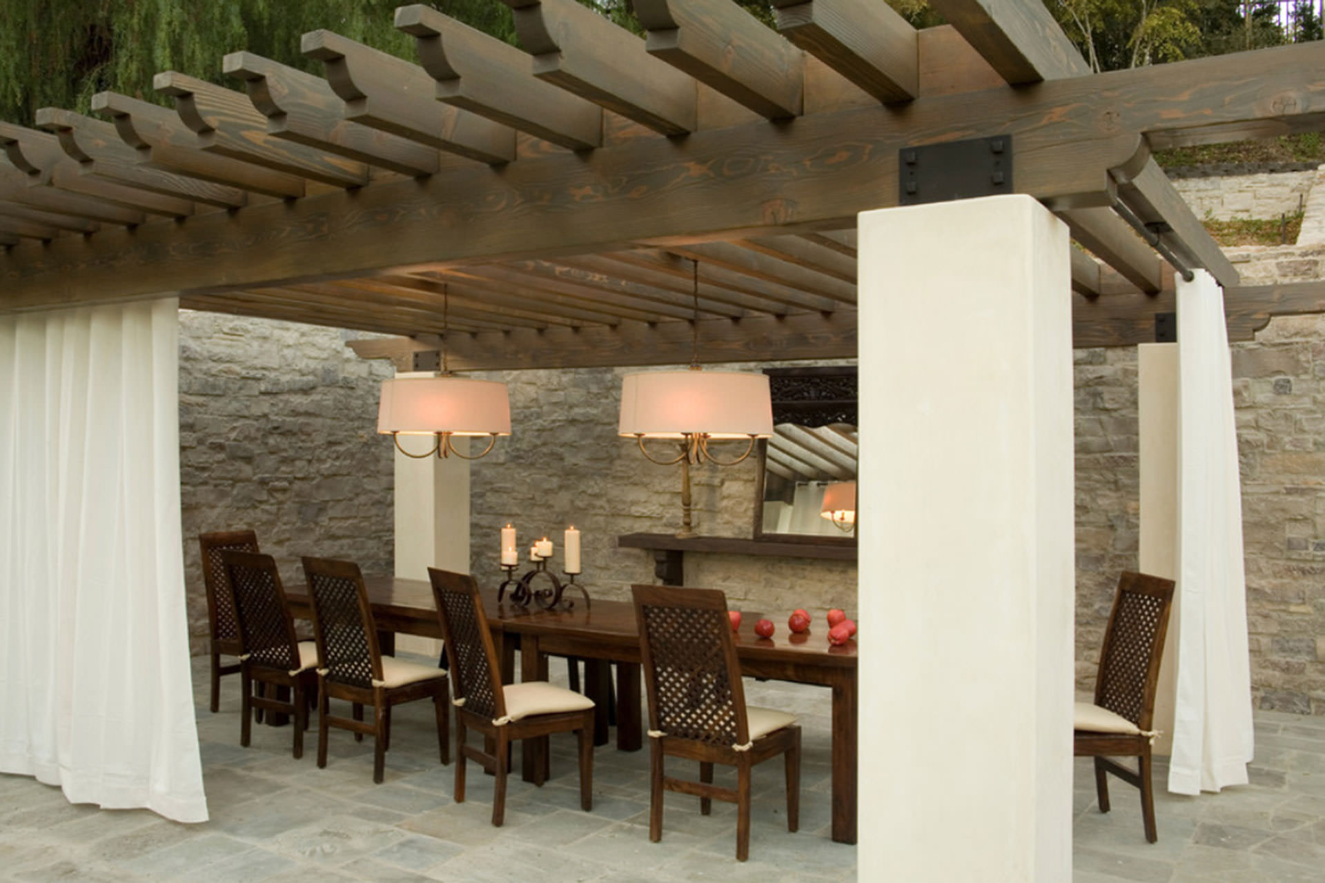 Outdoor Structure with dining area, lights and curtains