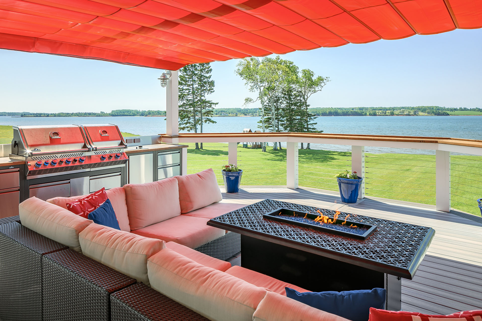 red retractable canopy over outdoor living area